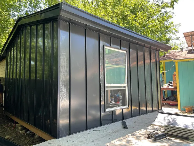 Black standing seam metal wall panels for Roof Inspection in Ellwood City